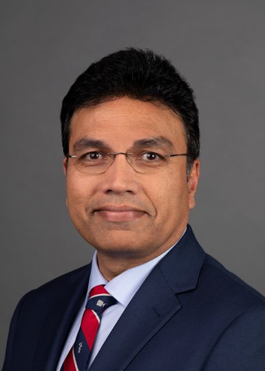 Dr. Singh, an internist, smiling